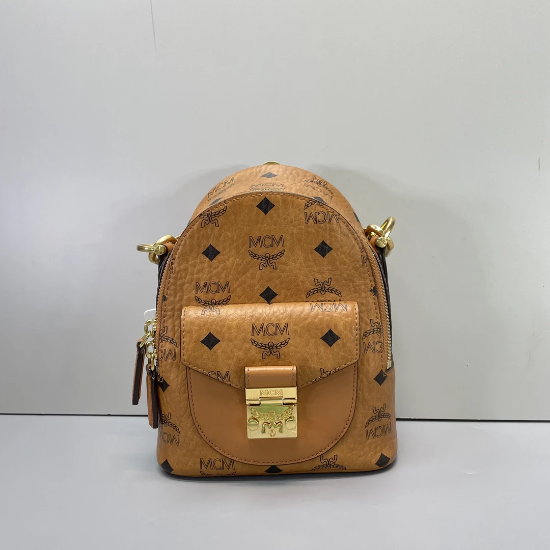 95新 MCM mcm干邑色迷你双肩包17*20*8cmE031415