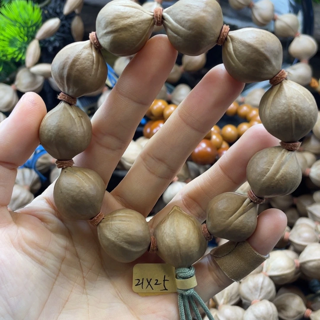 依***华吊坠橄榄核2125老料