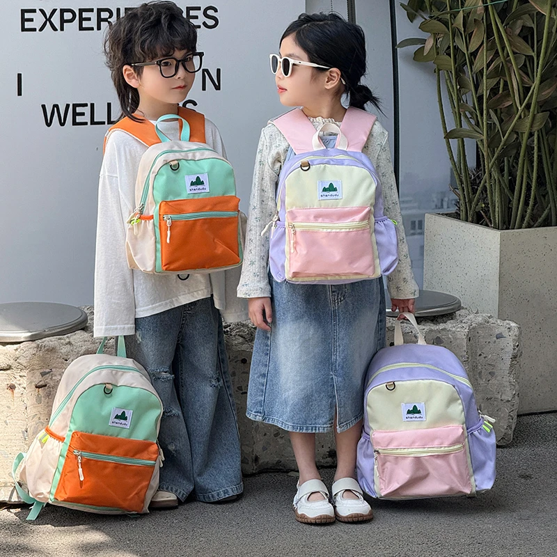 韩版ins儿童撞色书包休闲幼儿园男女孩出游旅行减负百搭双肩背包