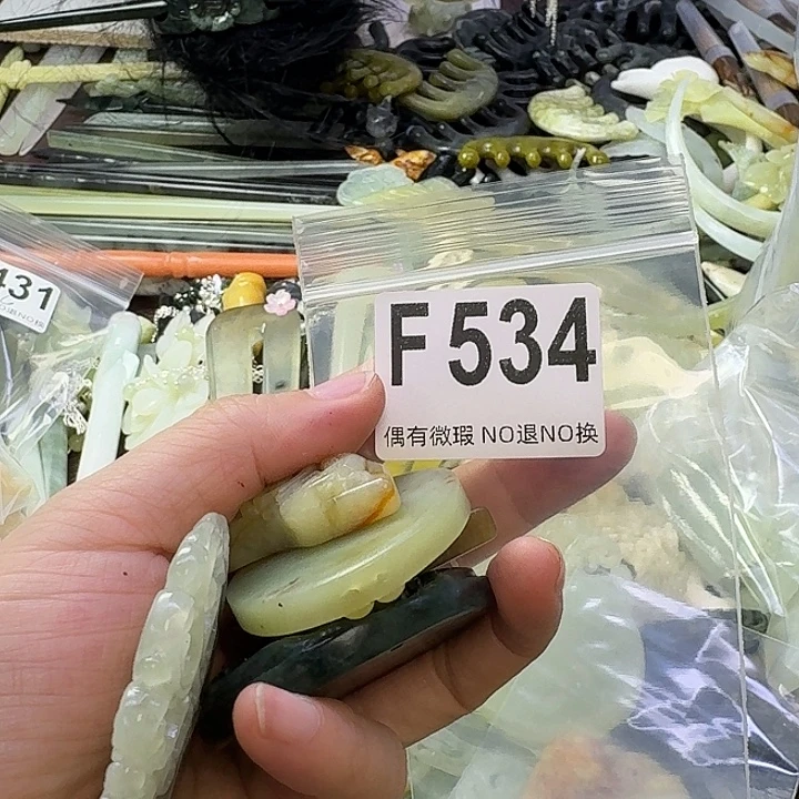 辛***婷合金蛇纹石玉发饰