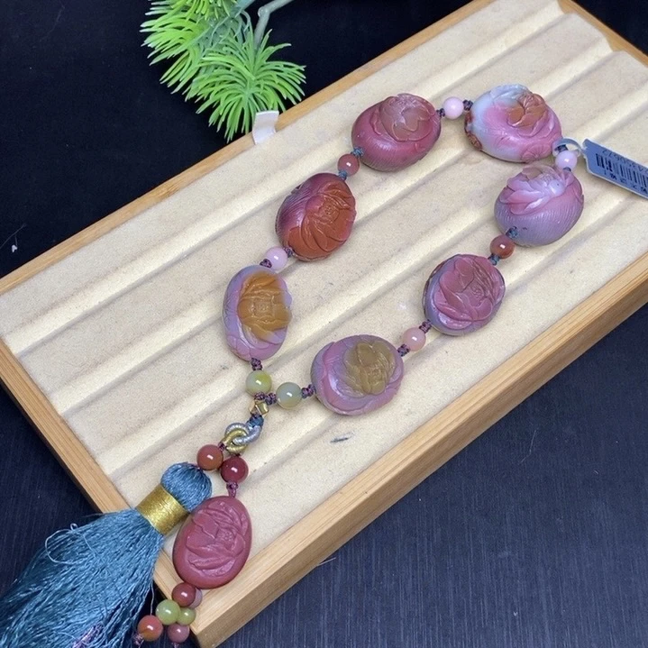 天然四川大凉山盐源玛瑙苏工雕刻蛋蛋牡丹花手持手串吊坠
