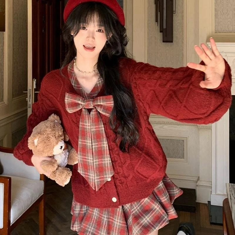 圣诞物语 秋冬新款日系甜美圣诞战袍蝴蝶结毛衣+格纹花苞短裙套装
