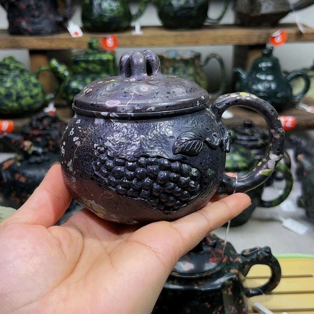 梅花石安山玉茶杯有裂