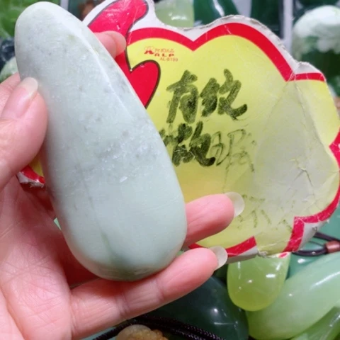 未镶嵌蛇纹石玉手把件