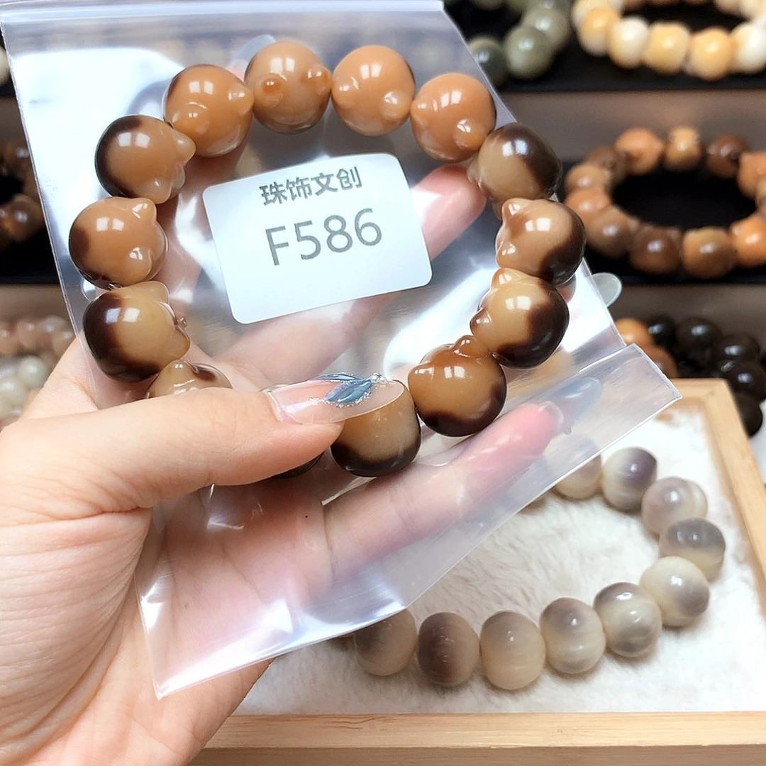 爱***妞吊坠菩提根/象牙果F586