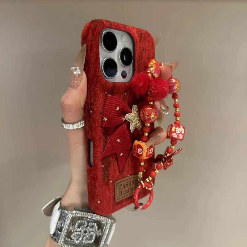 新年款适用苹果16promax毛绒挂链iPhone15蝴蝶结手机壳12红软