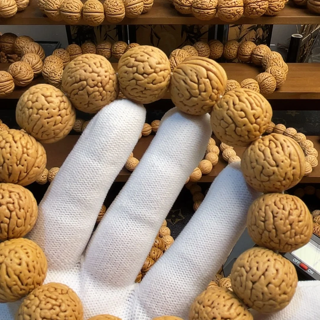 桃核吊坠大*高桩白月光手串