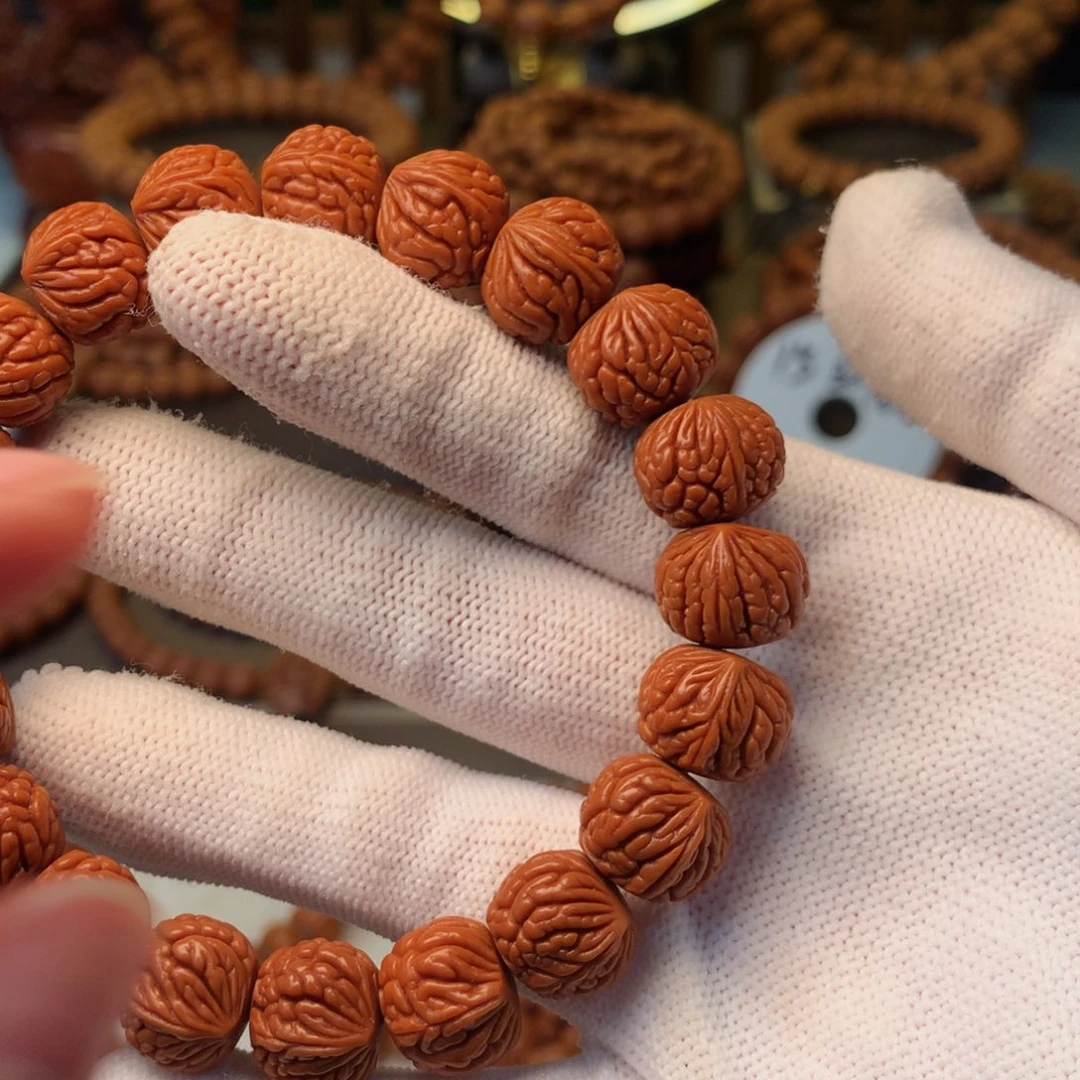 用***7手串桃核秦岭龙纹