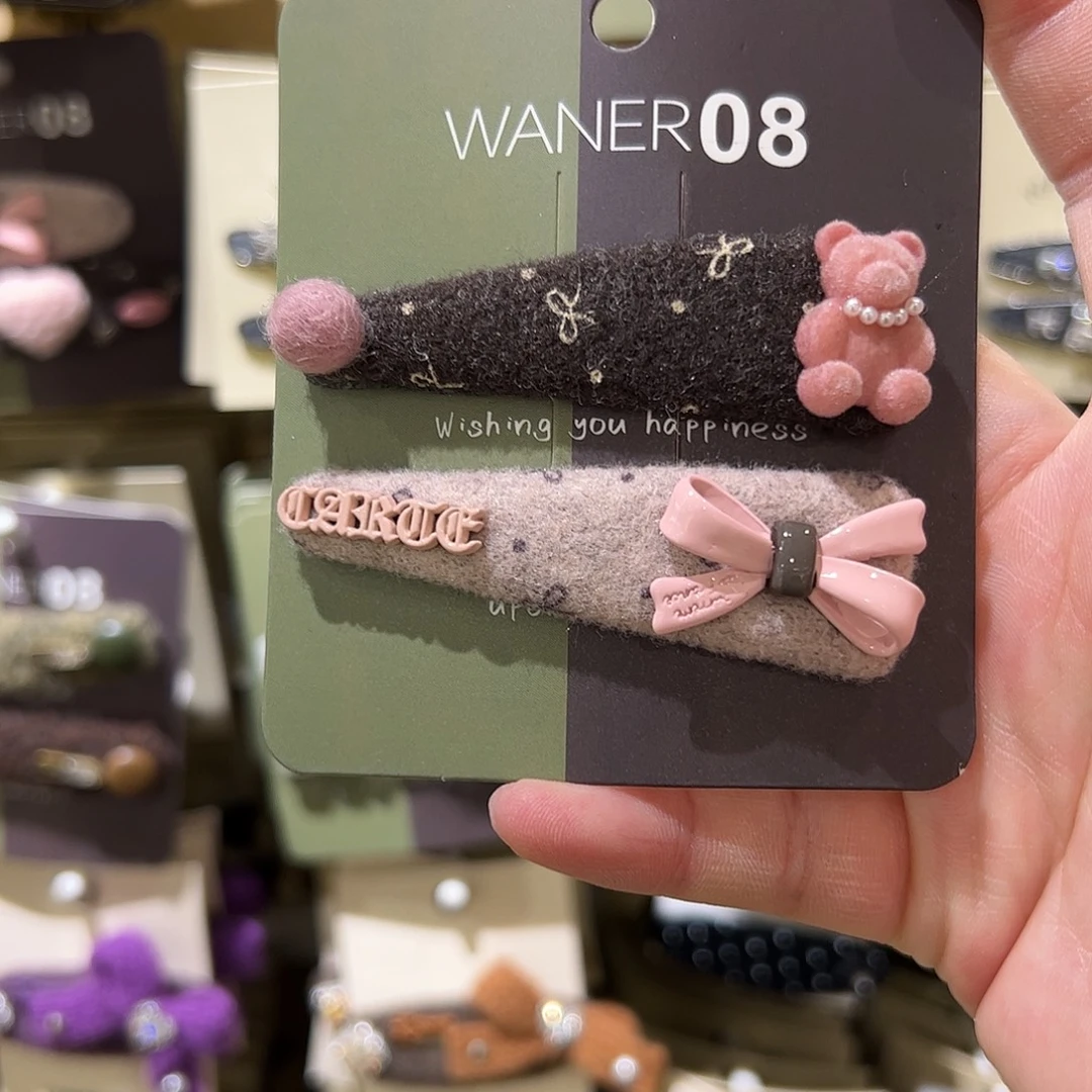 布艺非金属小熊蝴蝶结拜拜夹
