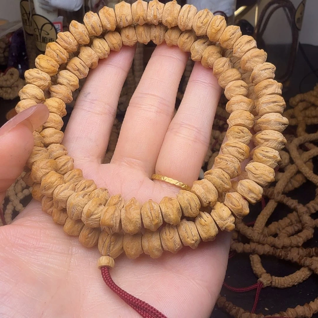 柏香籽/百香籽吊坠大嘴猴