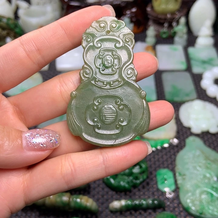 刘***生未镶嵌挂件翡翠清