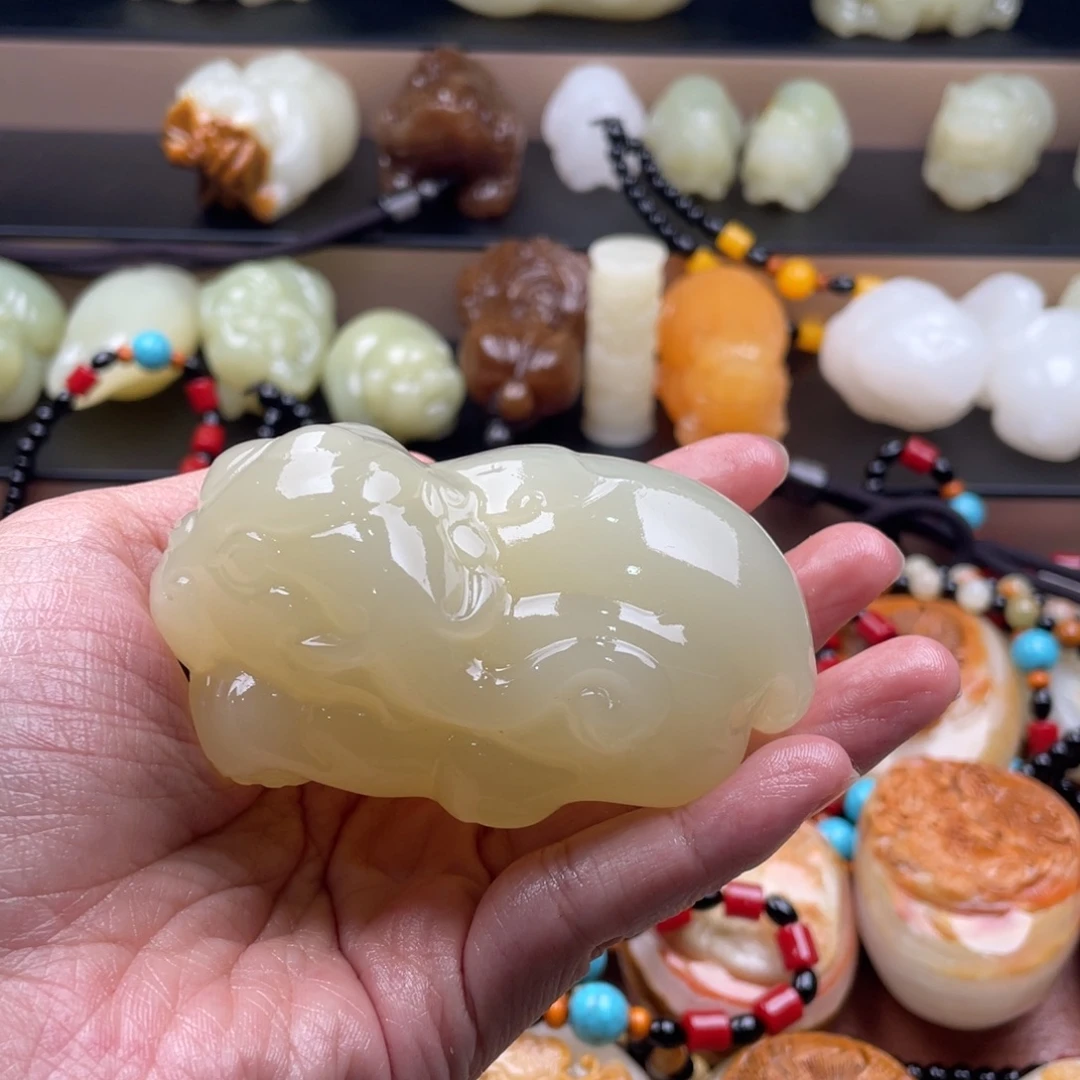 叮***奶石材古青石手把件