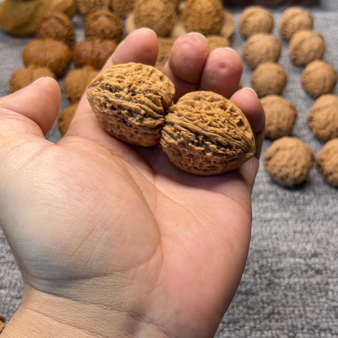 文玩核桃把件逐鹿南疆微瑕