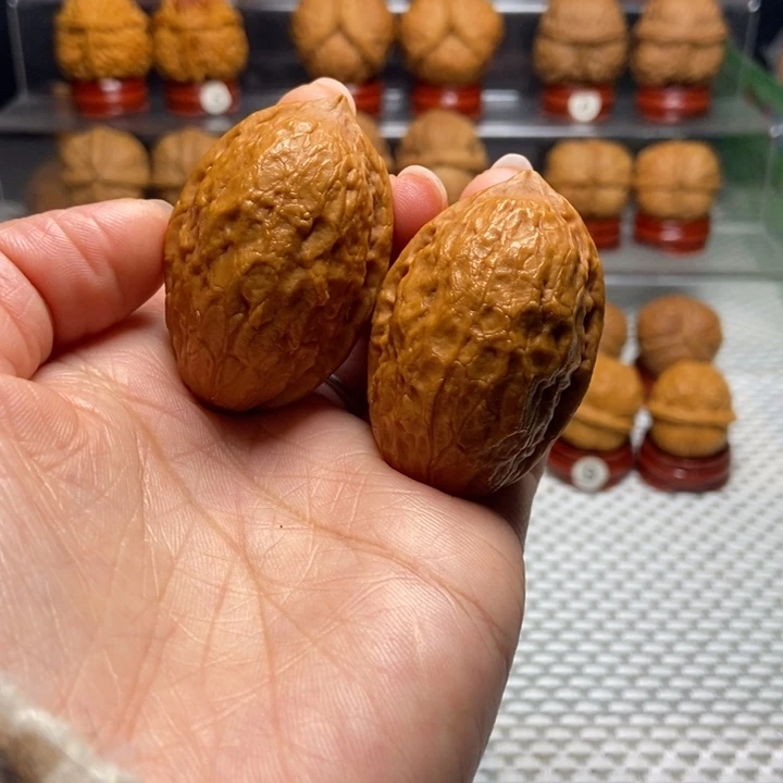 文玩核桃把件23金手指