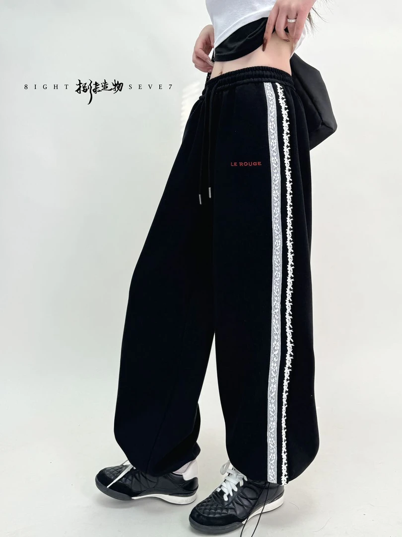 012【春季新款】刺绣单排小字母花边两穿休闲裤（BQ811）