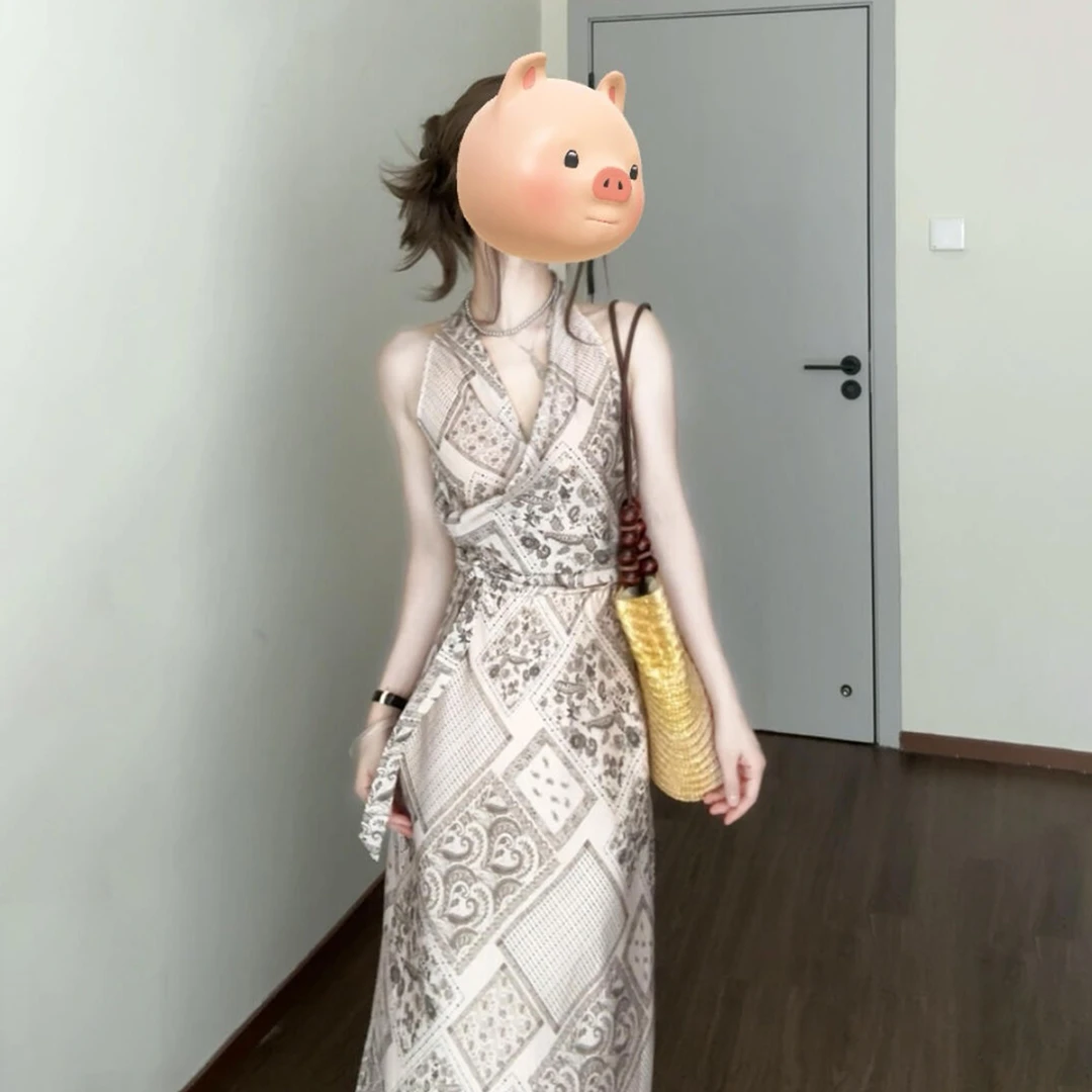 法式印花挂脖吊带连衣裙子女夏季2026新款波西米亚老钱度假风长裙