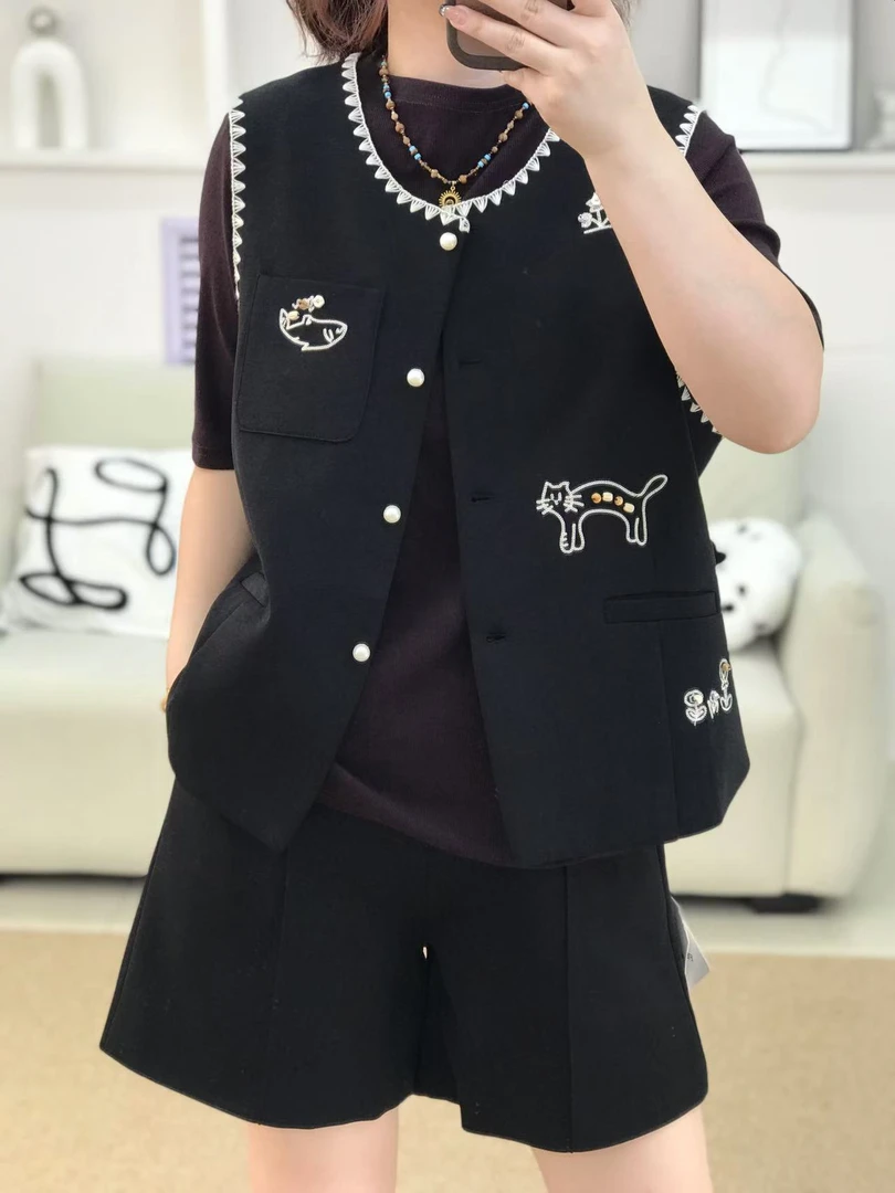 {莹莹推荐}58110秋季大码女装简约花纹马甲