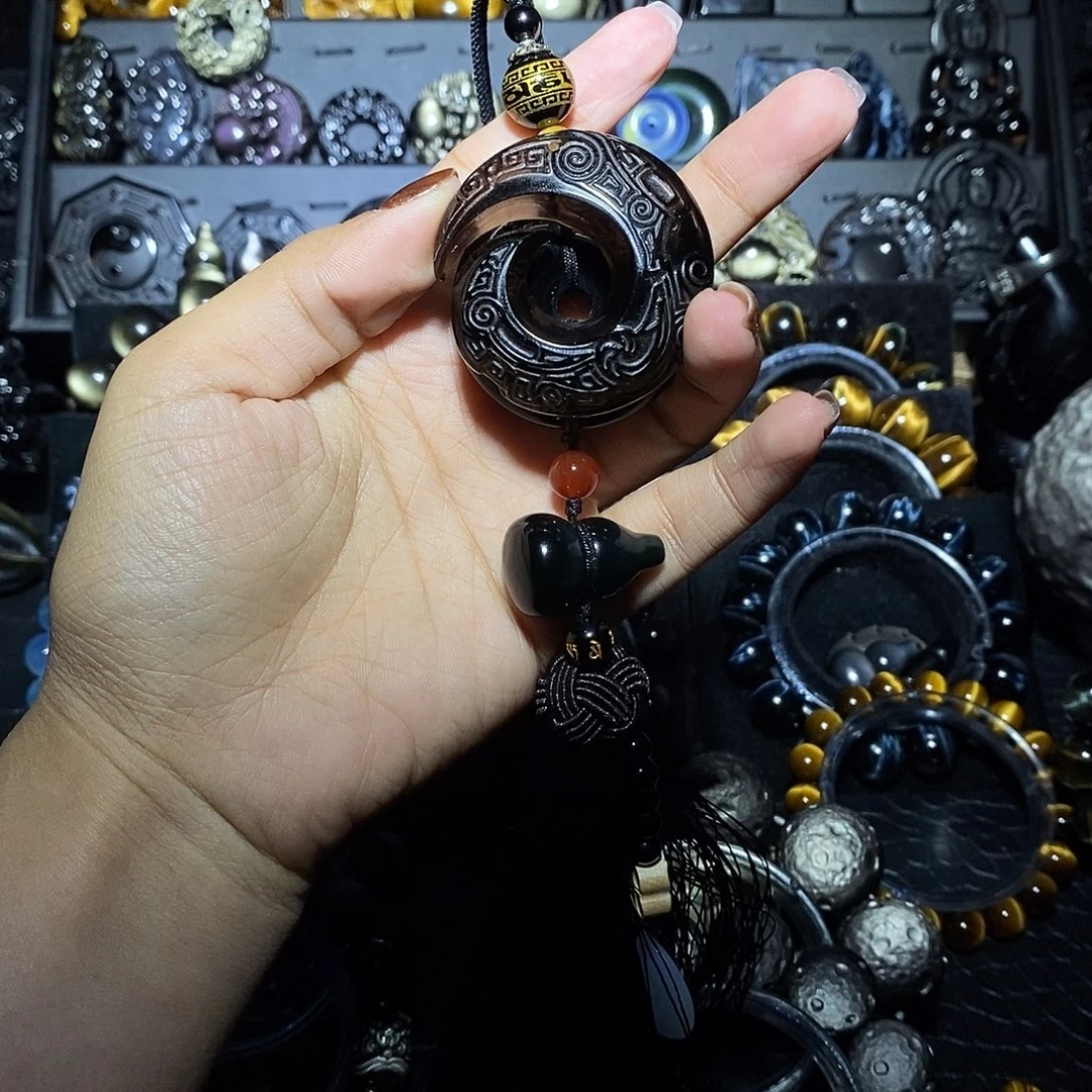 冯***光黑曜岩未镶嵌手链