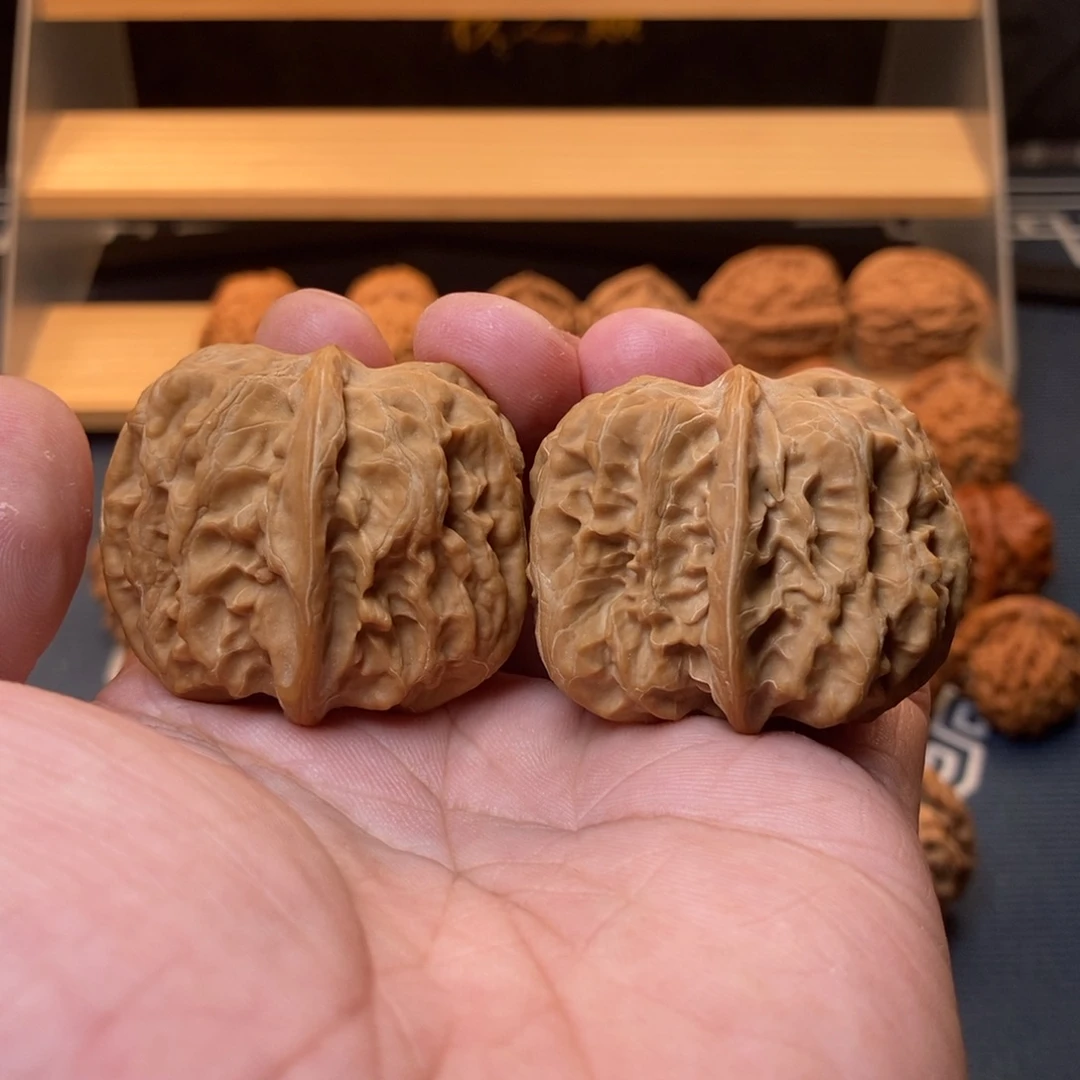 龅***伴文玩核桃把件42精配瘦方块