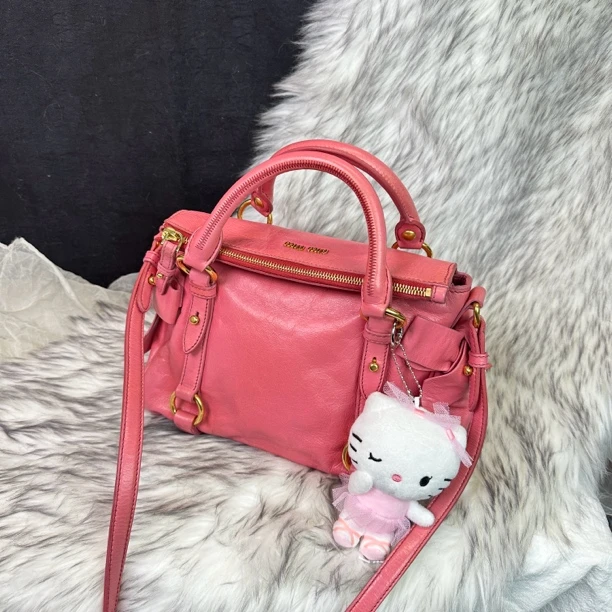 95新 MIU MIU/缪缪 小号蜜桃粉蝴蝶结手提斜挎包