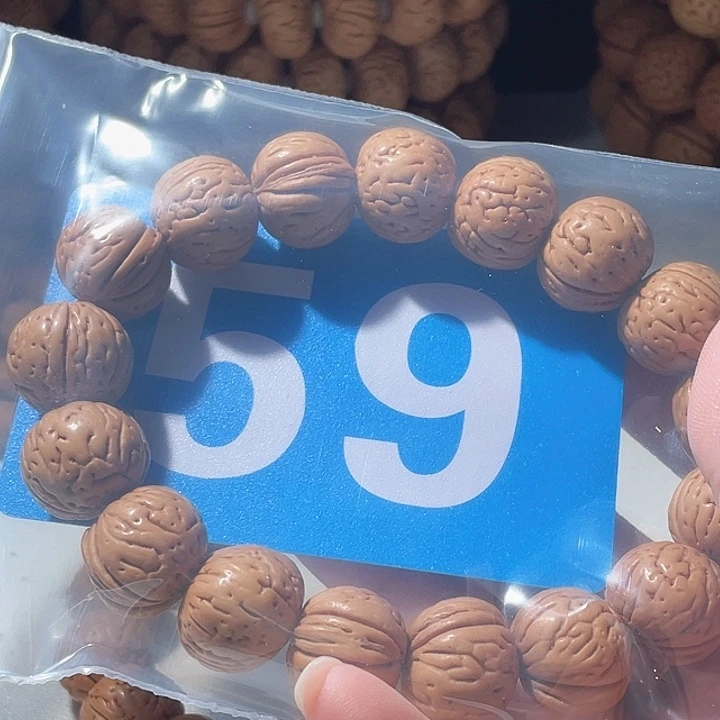 用***8桃核吊坠桃核手串元宝59