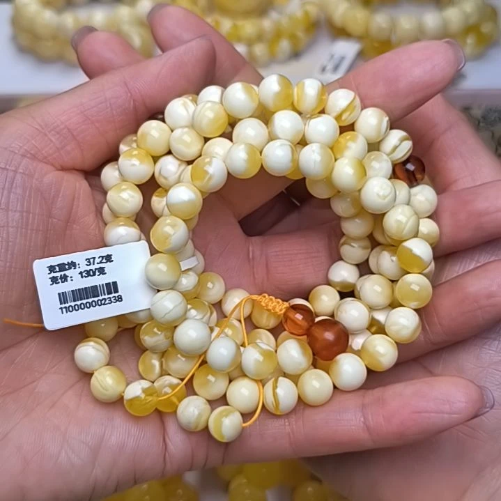 永****未镶嵌蜜蜡裸石8+108串珠