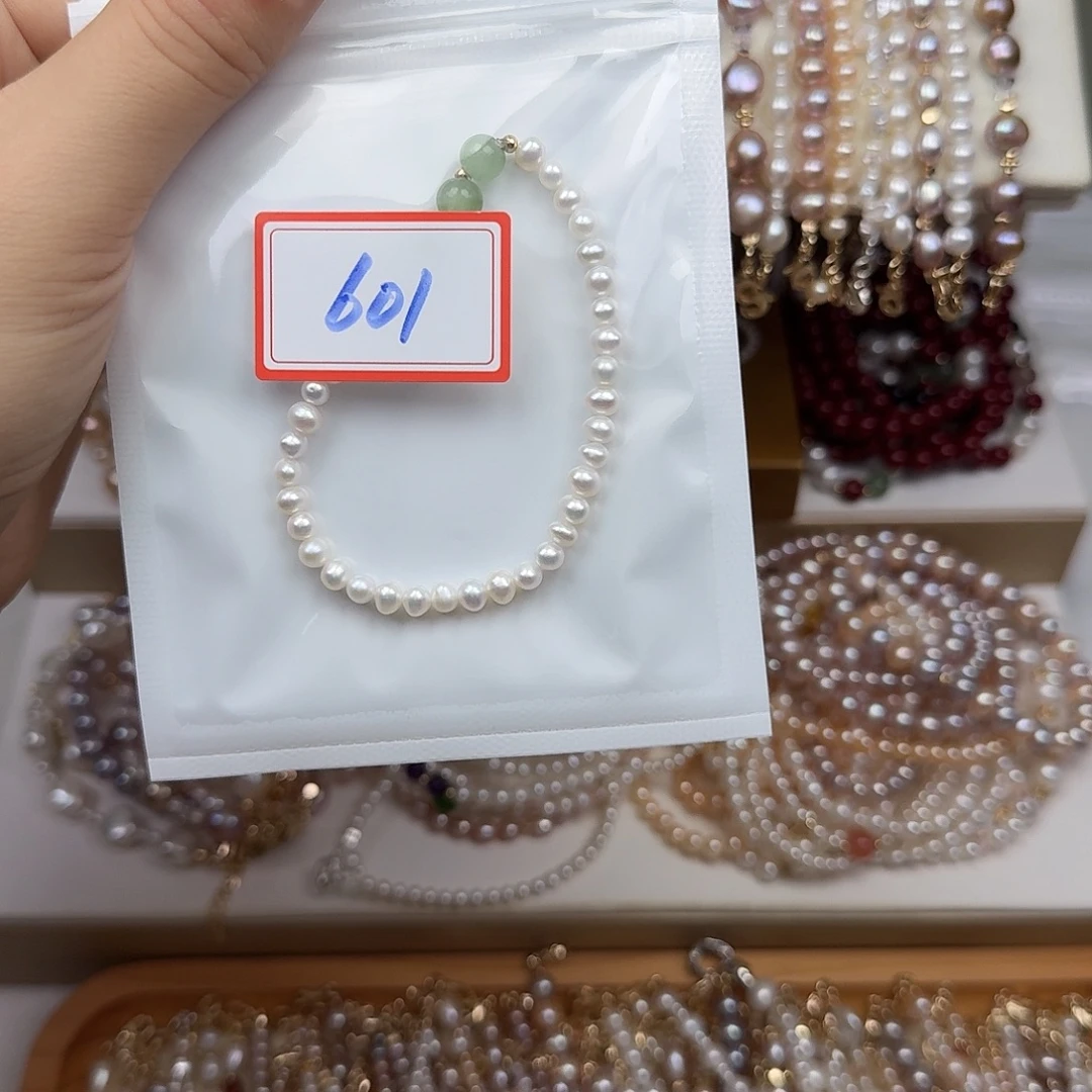 T***青钛钢手绳淡水珍珠