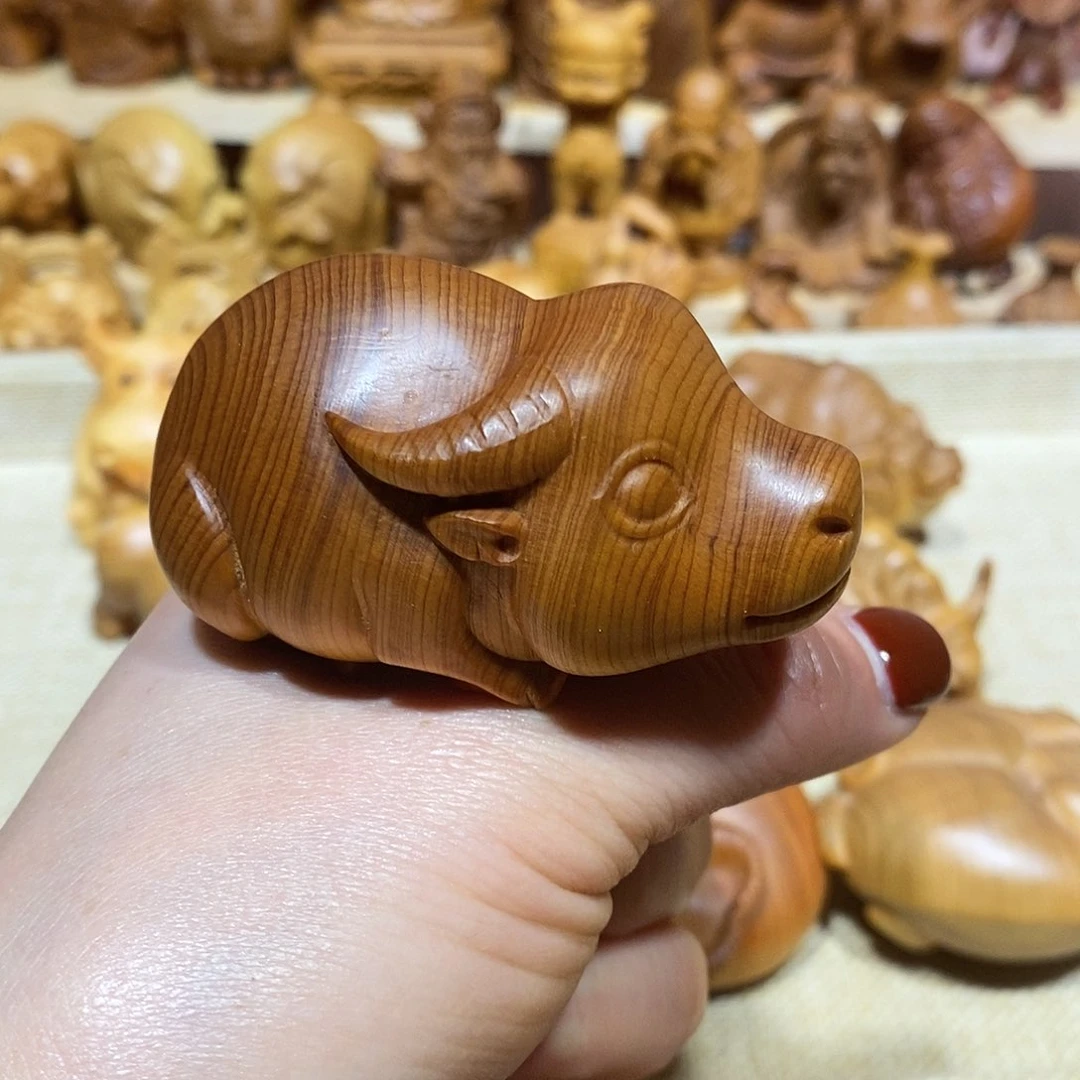 木菠**贝崖柏手把件，牛