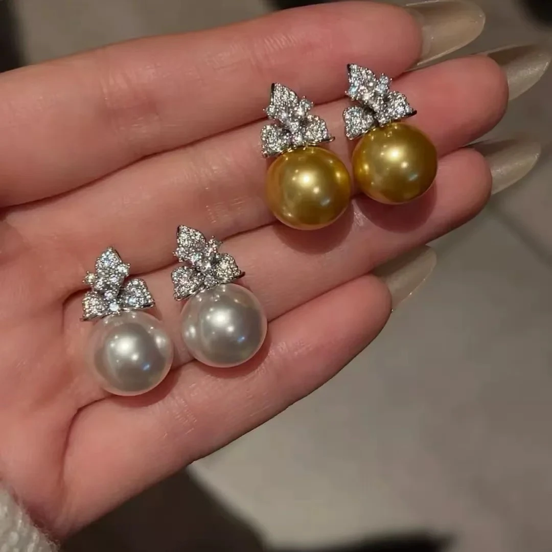 925银耳饰 意式设计感新款玉兰花南阳浓金色奥白色耳环优雅显贵