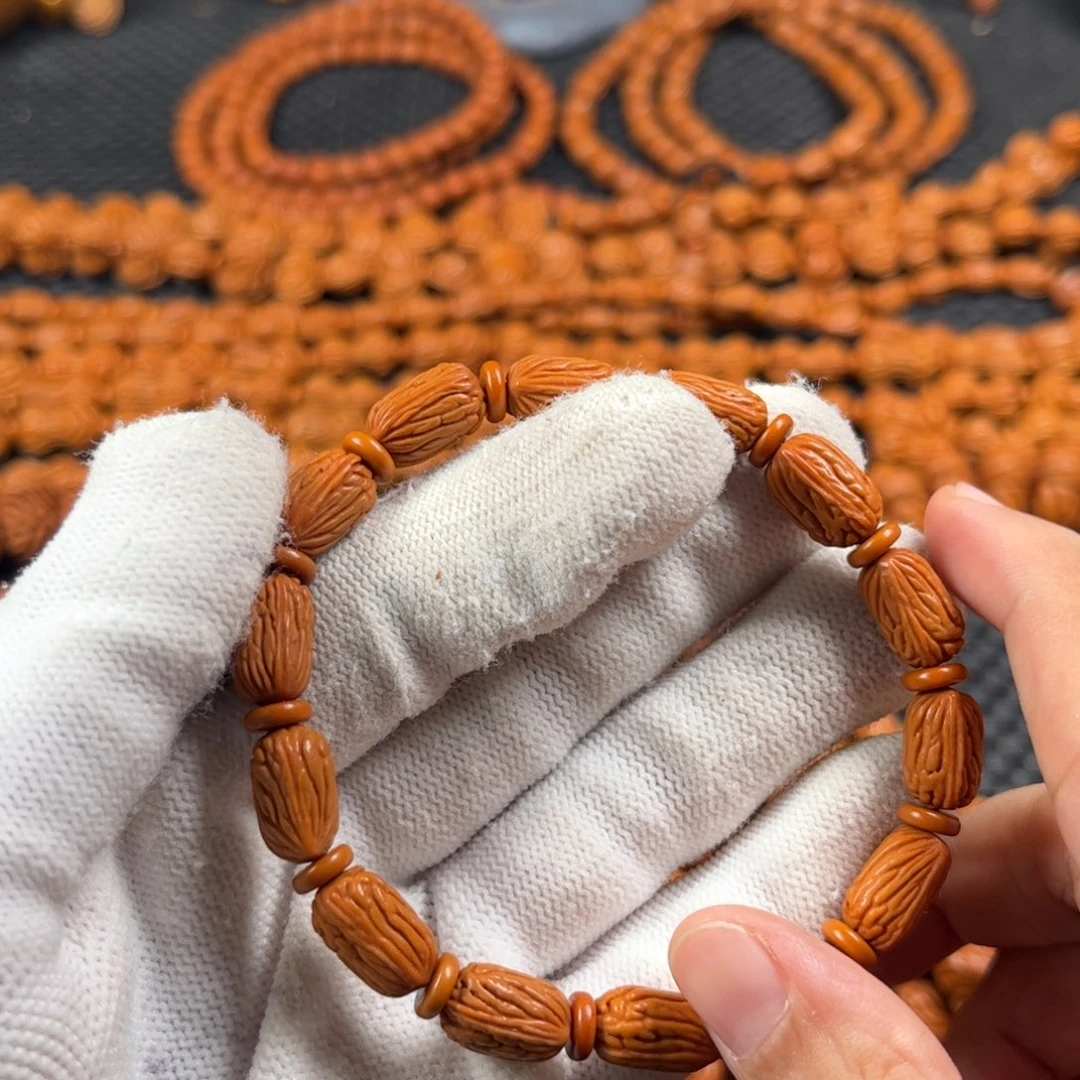 兄****手串桃核W11号链接手串