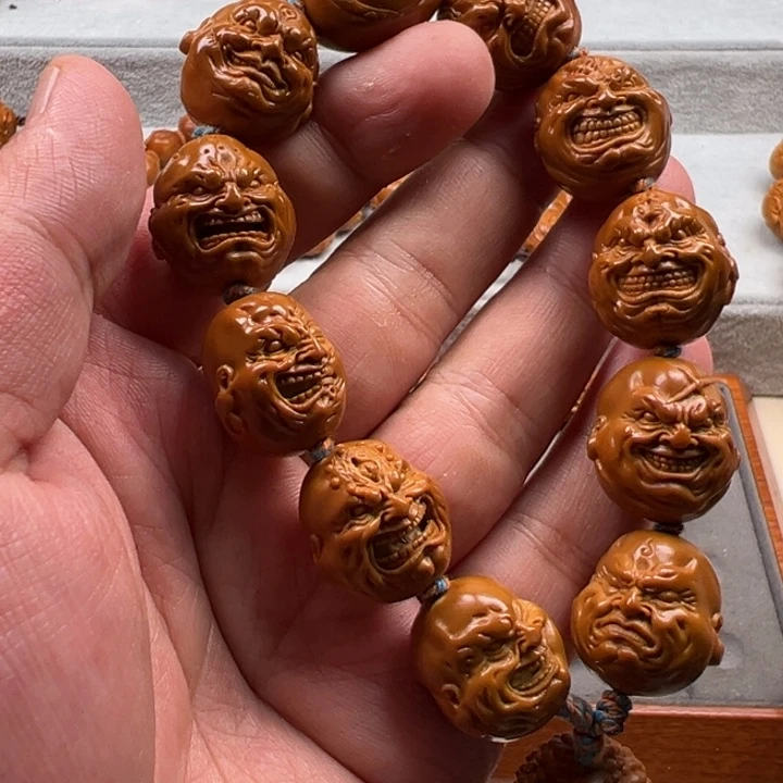 我***用橄榄核手串橄榄核雕工艺制作