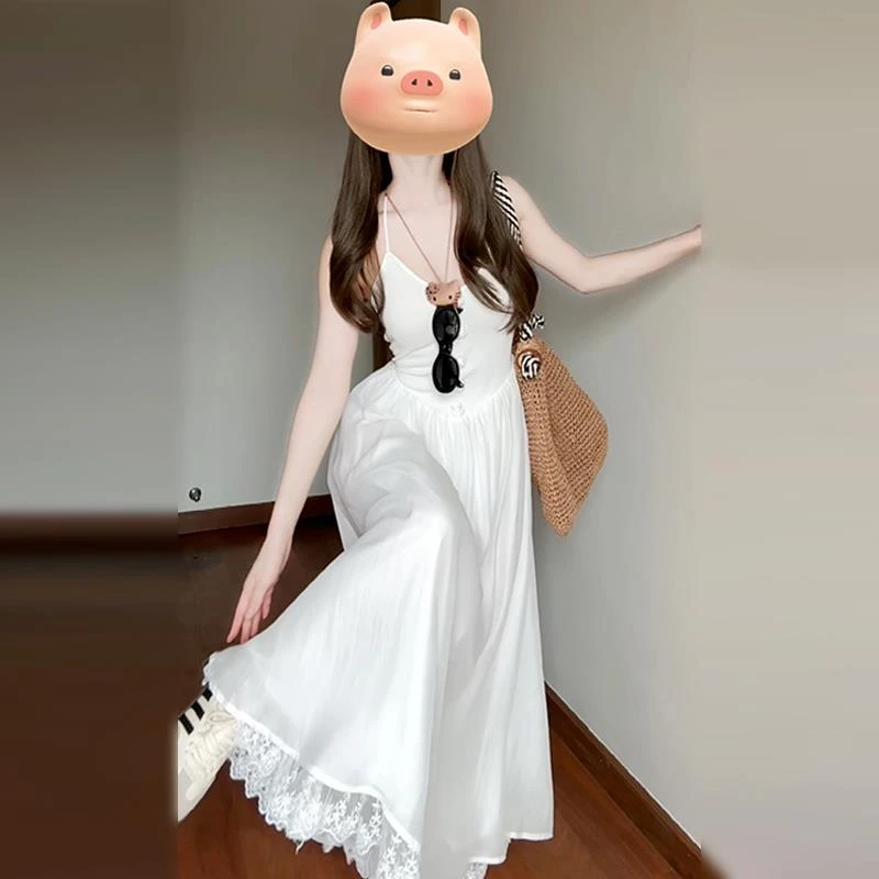 法式气质白色挂脖吊带连衣裙子女夏季2025新款轻奢高级感绝美长裙