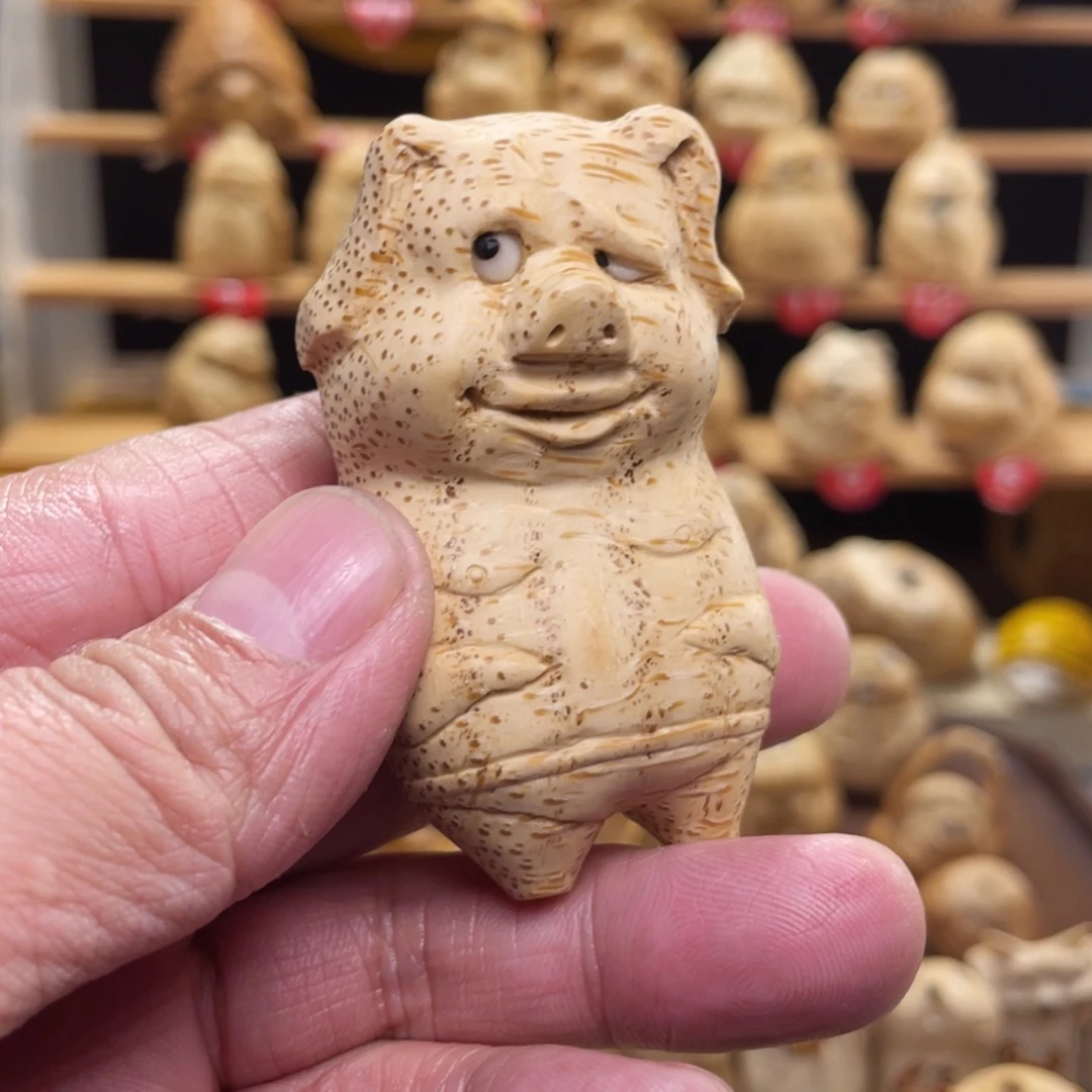 竹竹根雕小猪手把件