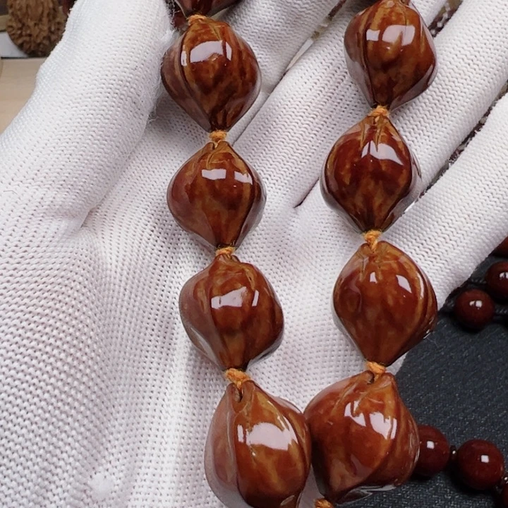 橄榄核吊坠老****店橄榄核