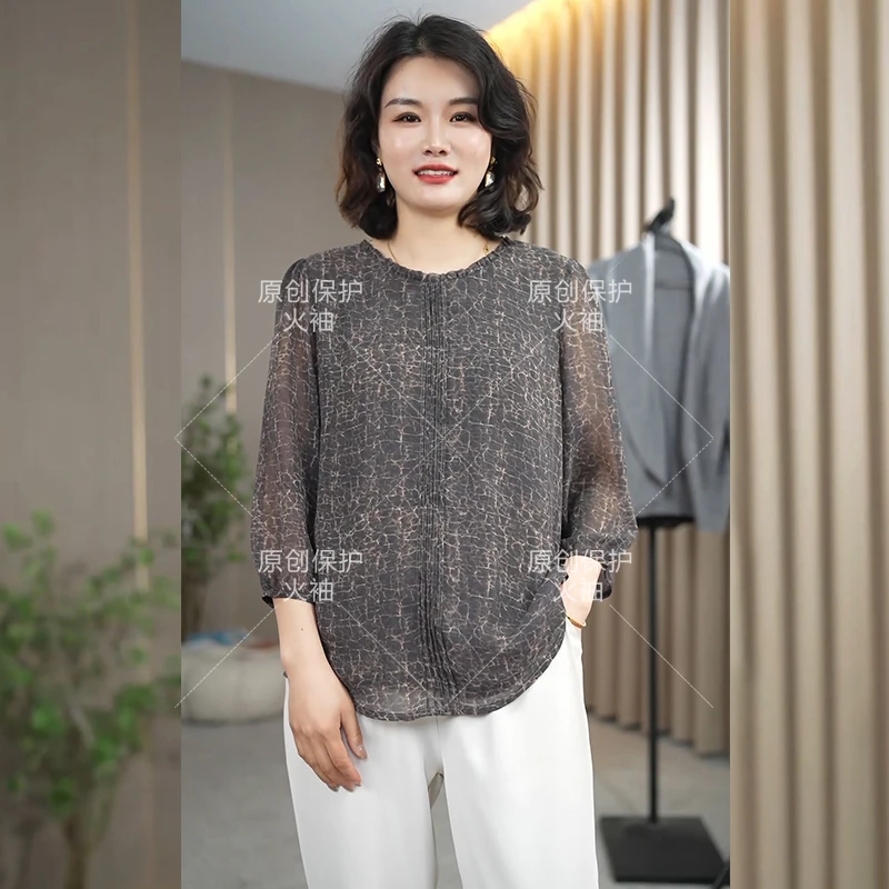 火袖F876时尚压褶圆领女士上衣2025春季新款宽松显瘦印花套头小衫