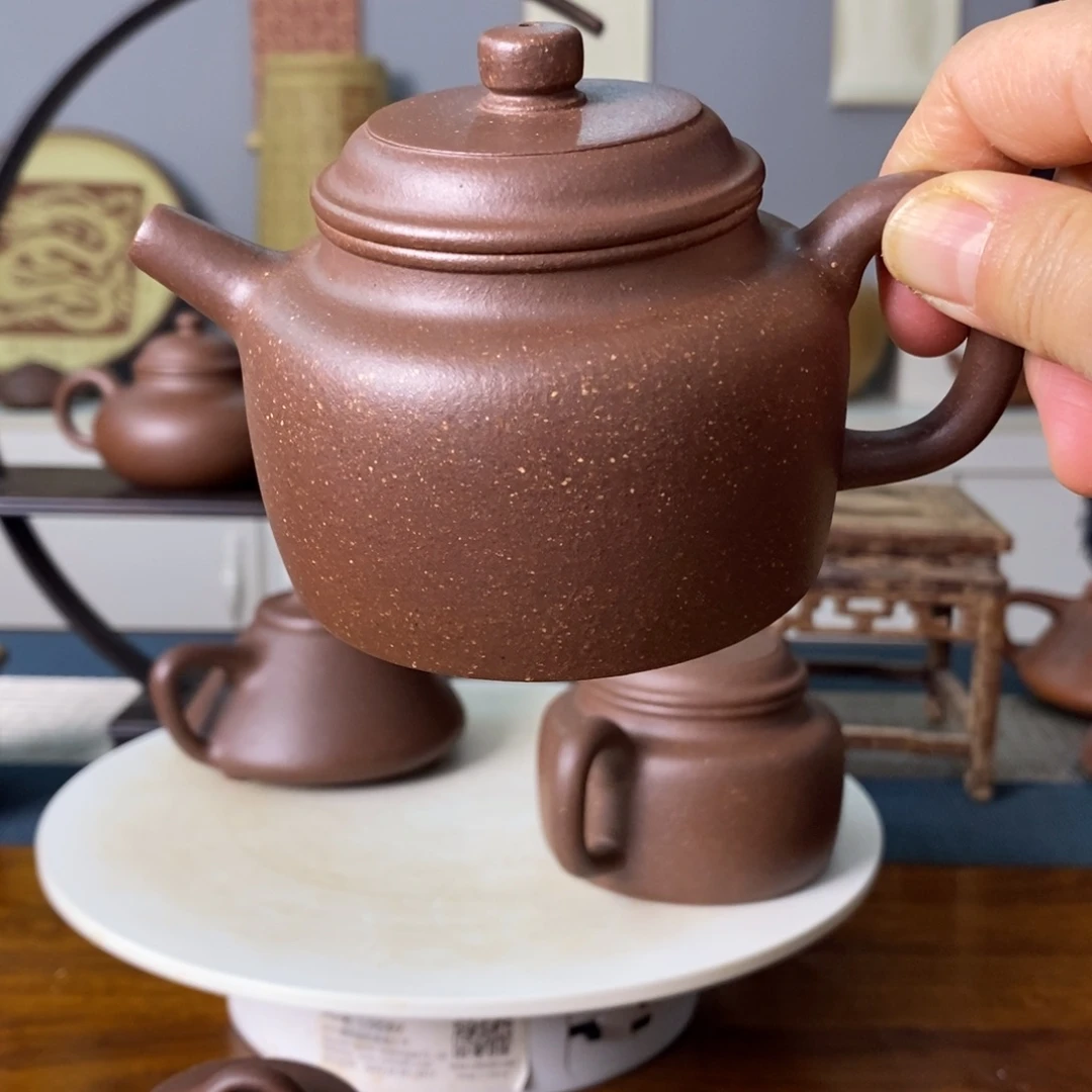 紫砂茶壶浮**露宜兴紫砂艺术拍价