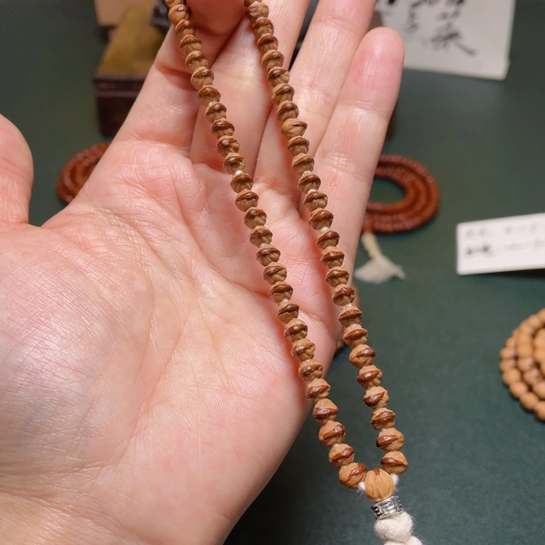 吊坠柏香籽/百香籽小凤眼手持