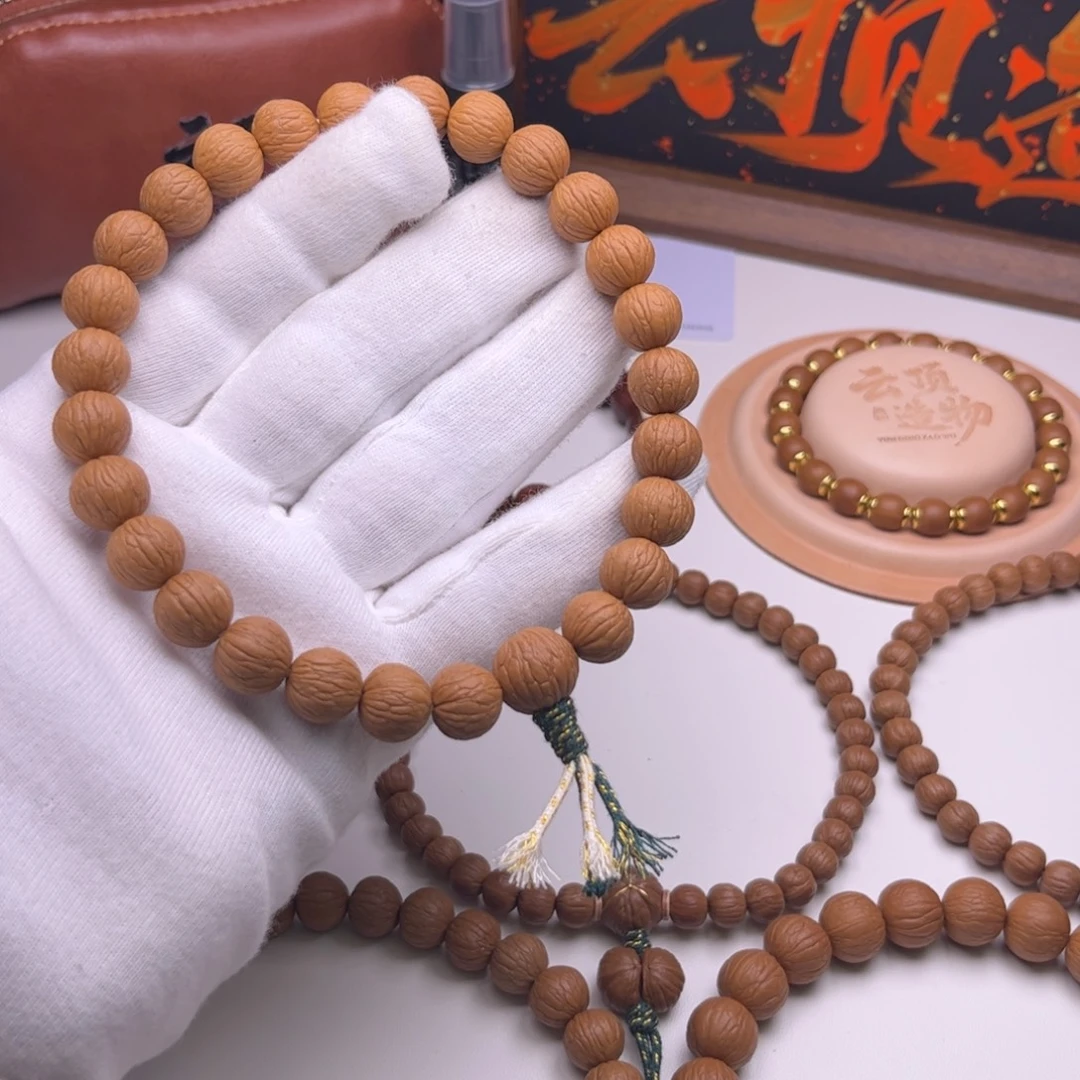 灏***阳猴头核桃吊坠12.0凤羽