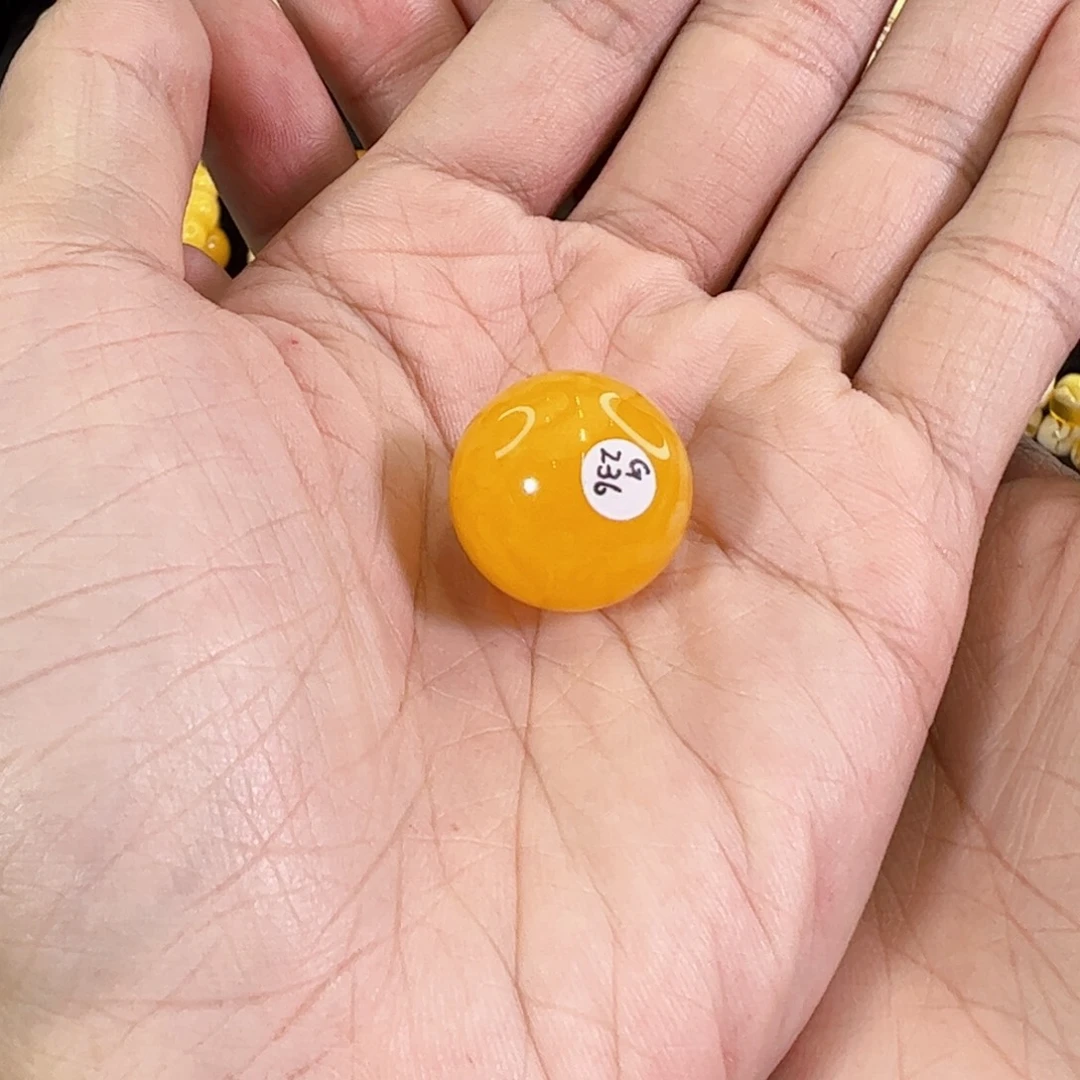 琥珀未镶嵌裸石鸡油红圆珠