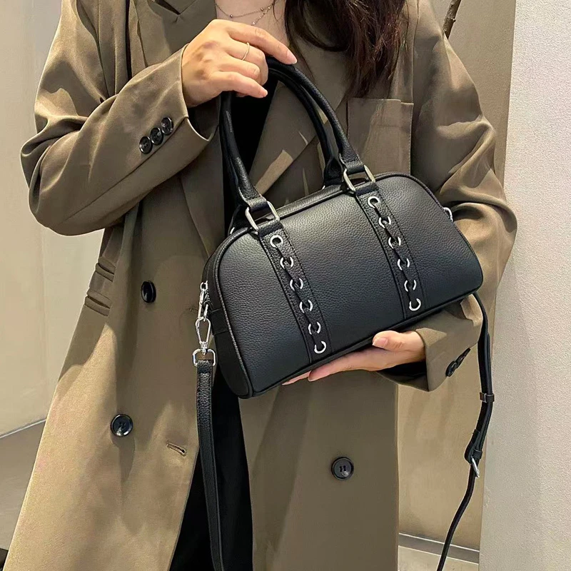 2025冬季新款真皮大容量斜挎手提包女百搭牛皮波士顿枕头包放雨伞