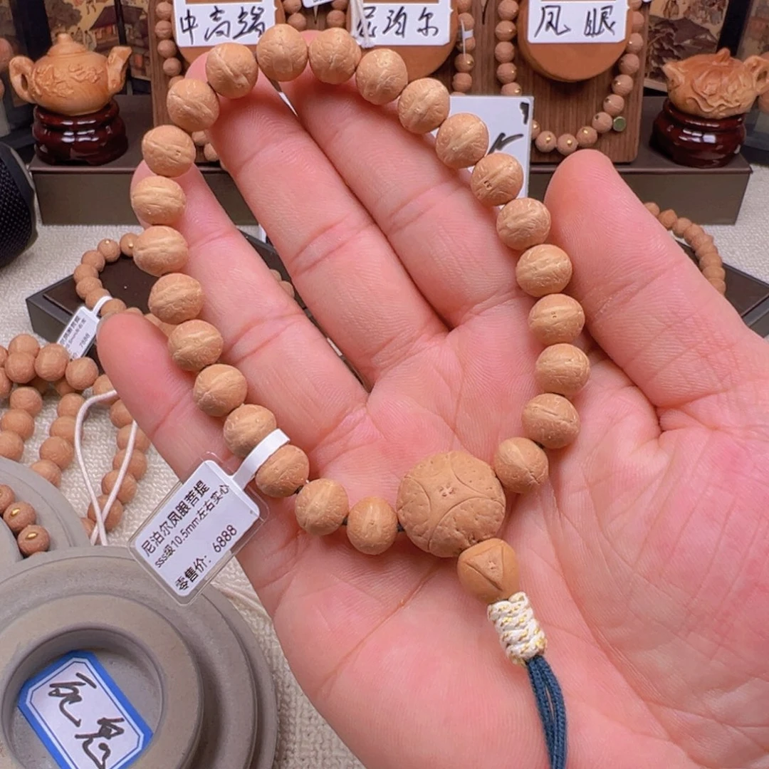 奥***、凤眼菩提手串10.5mm左右实心