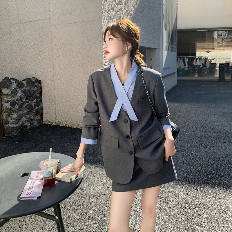 韩系学院风设计感套装裙女2025春季新款假两件西装外套短裙两件套