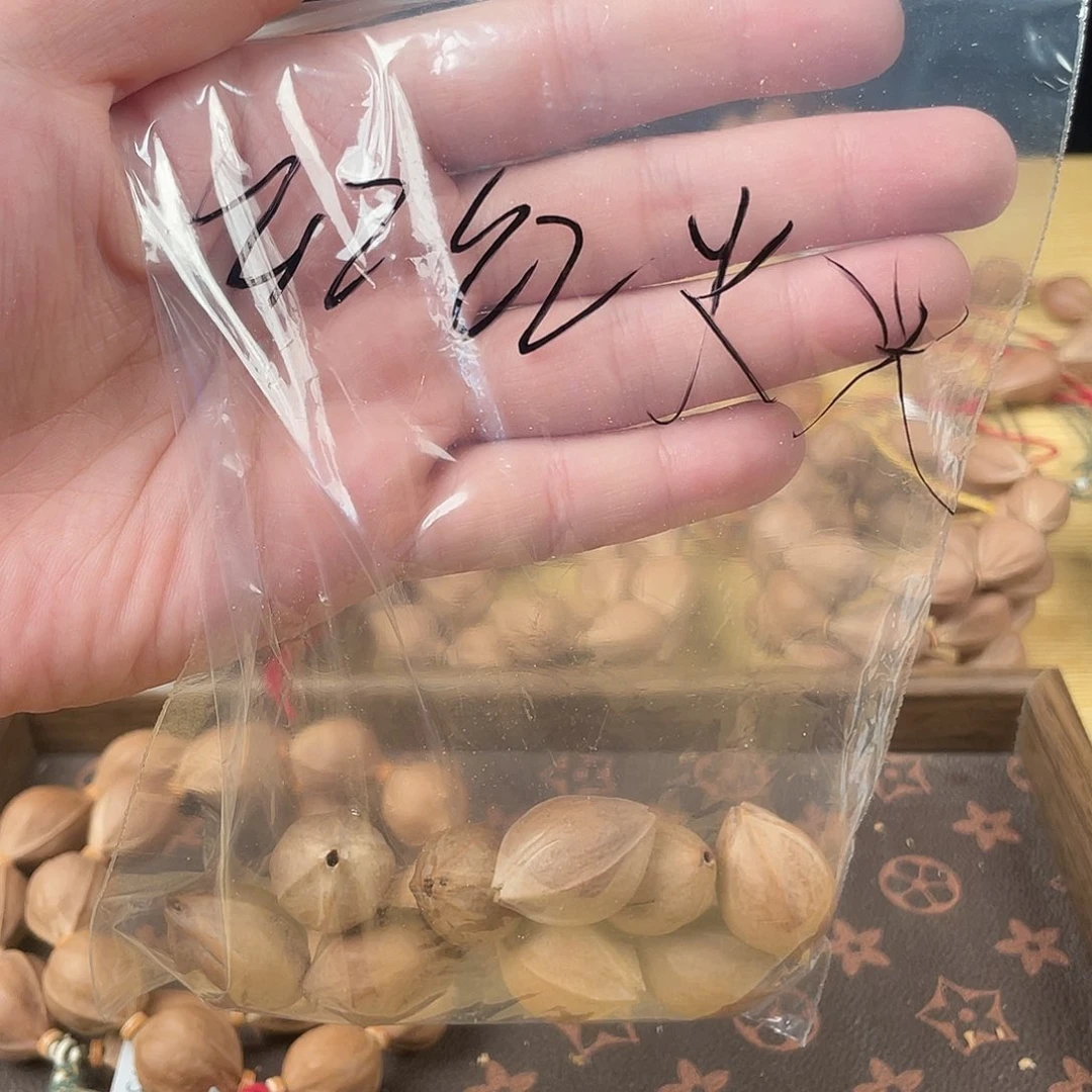 红***惚橄榄核吊坠梅林铁核19.528红红火火