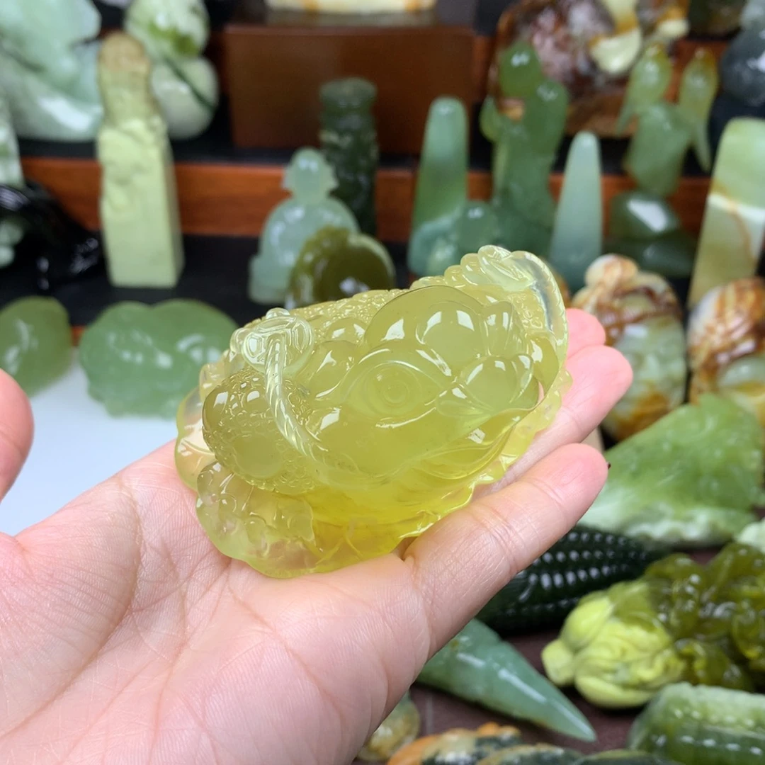 岫玉未镶嵌手把件包**、