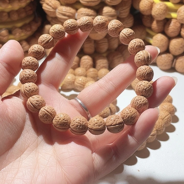 桃核吊坠桃核手串野生。31