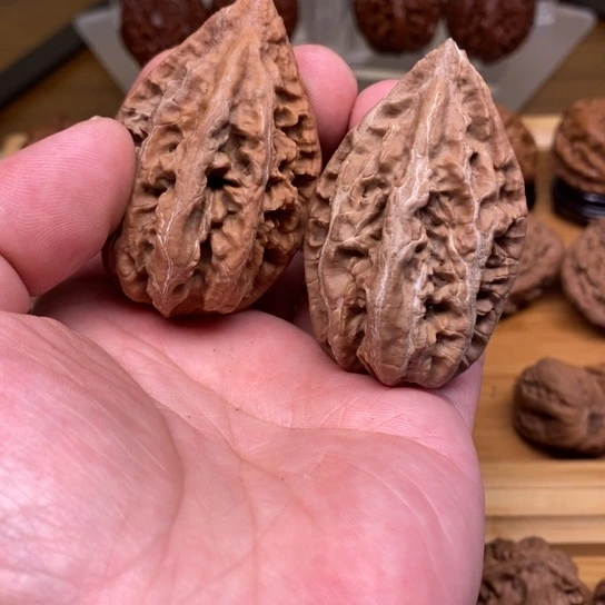 桃核把件塔尖红皮东北秋子