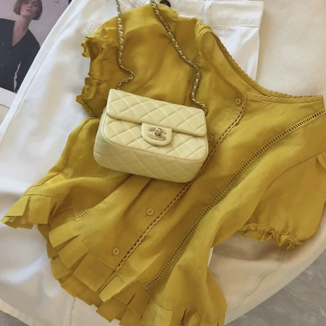 法式复古蕾丝拼接黄色短袖衬衫女2025夏季宽松显瘦百搭减龄上衣