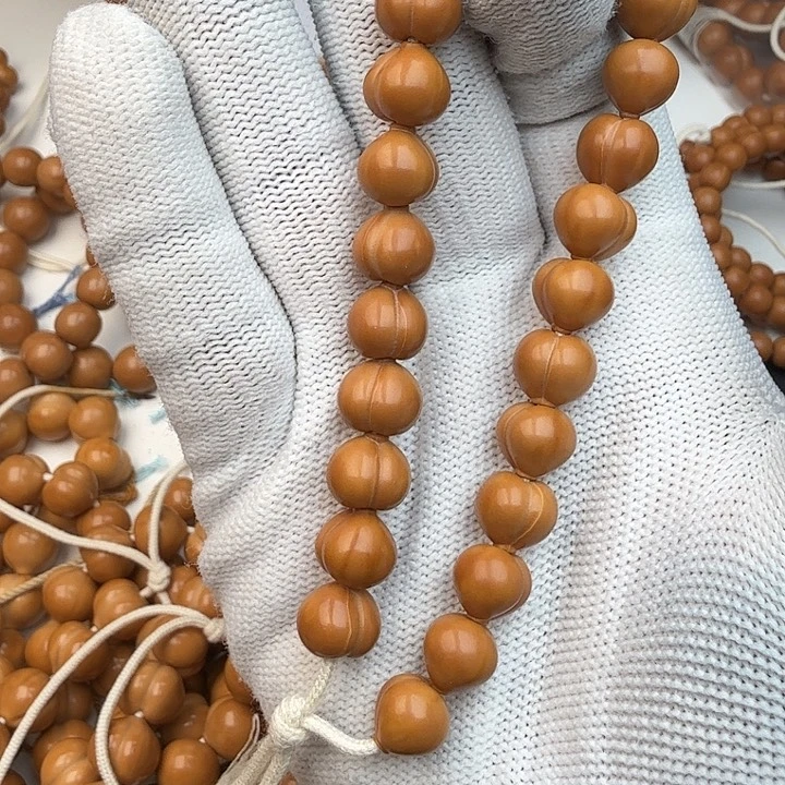 是***妳吊坠猴头核桃屁桃