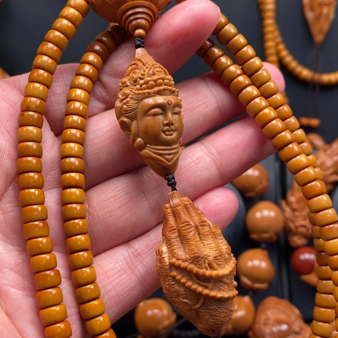 橄榄核手串观音脖挂