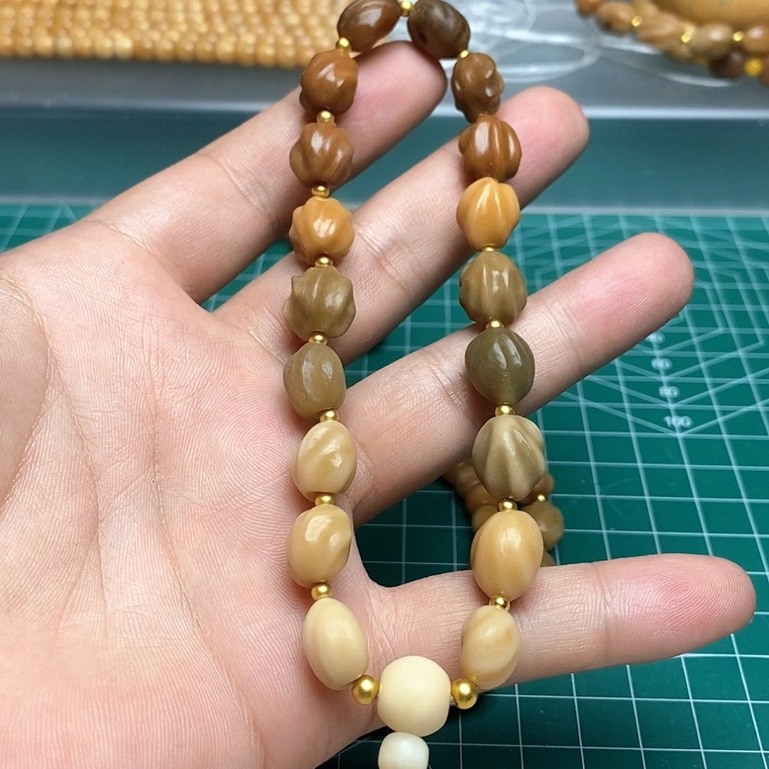 菩提根/象牙果把件龙脊菩提原籽手持多宝渐变色纯手工